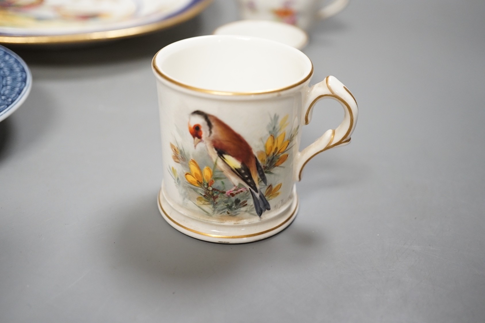 A 19th century enamel on copper trinket box, depicting a shipping fleet, together with a Chamberlain’s Worcester bird plate, a Royal Worcester coffee cup, a Meissen tea cup and three Chinese export cups (9)